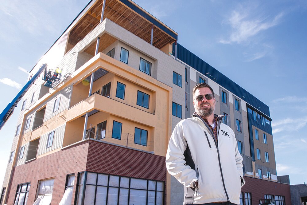 Developer Sam Coryell of Coryell Collaborative Group says the high-end Heritage Apartments development is a smart repurposing of a busy corner.
